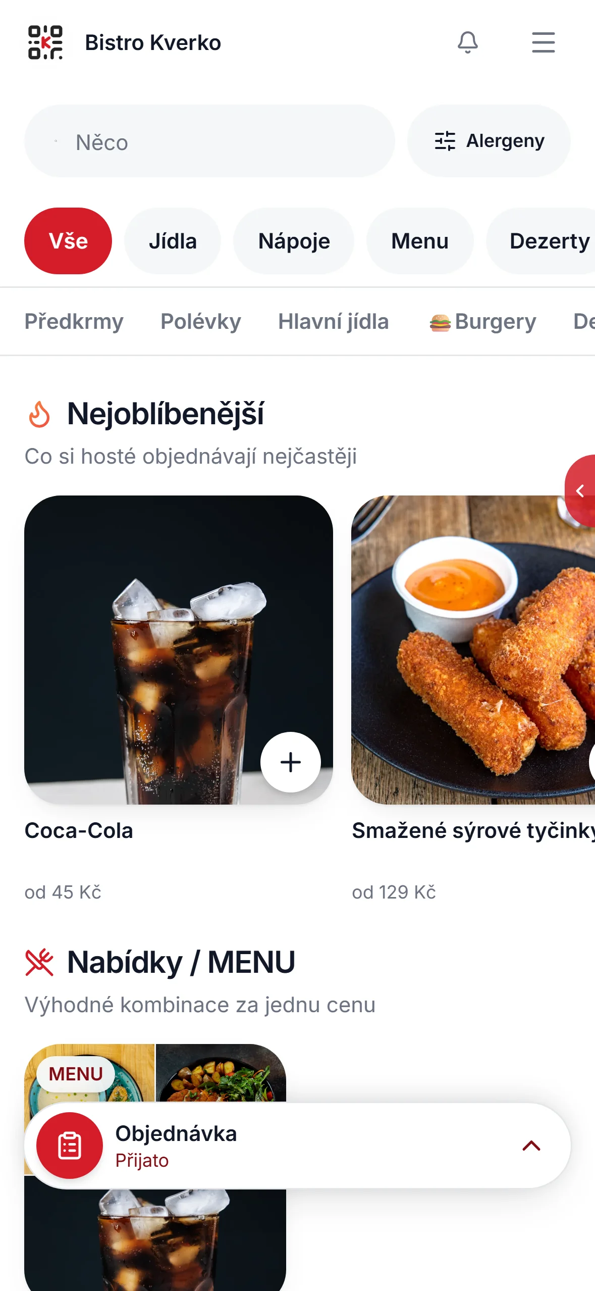 Menu v telefonu hosta v červené barvě restaurace